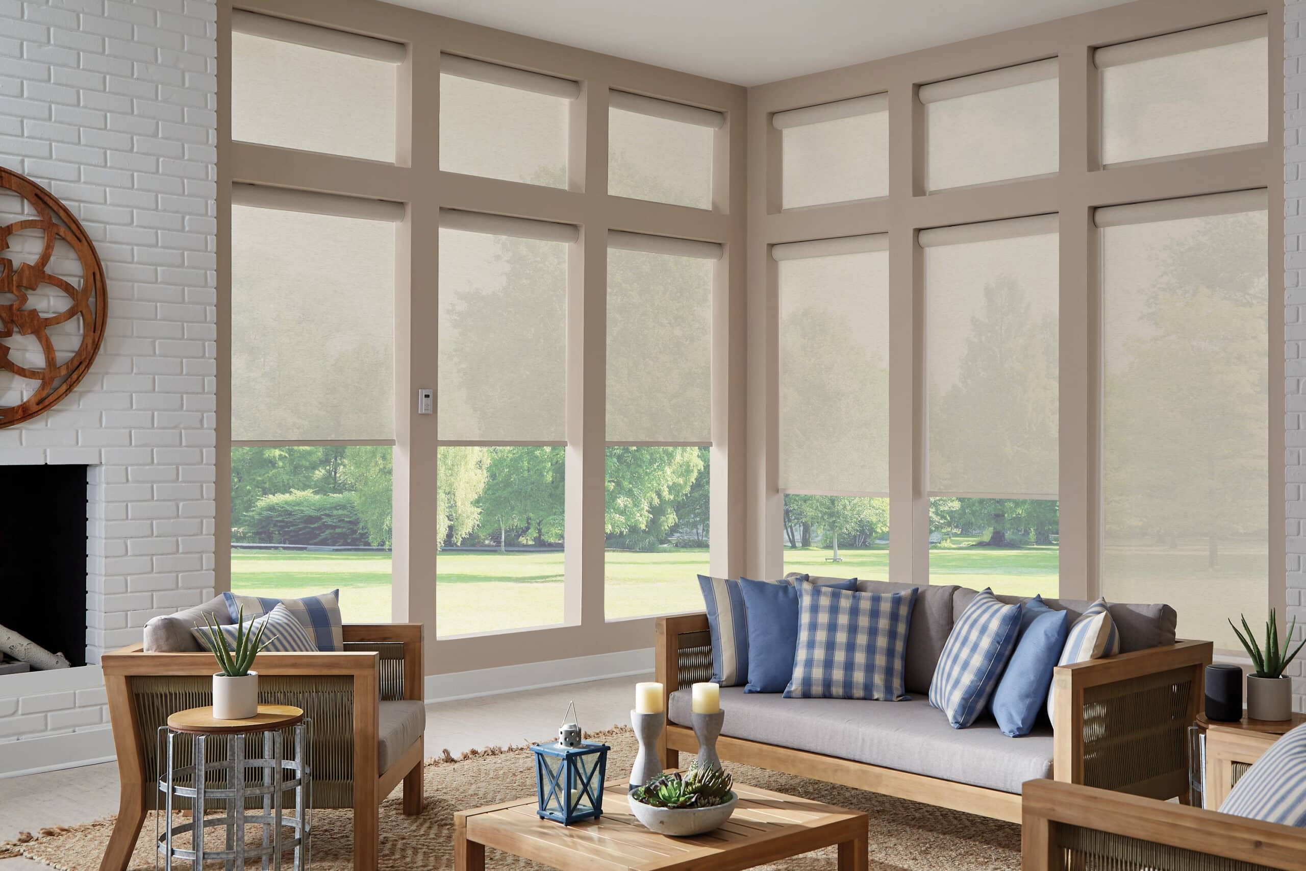 Solar shades filtering in natural light into a living room.